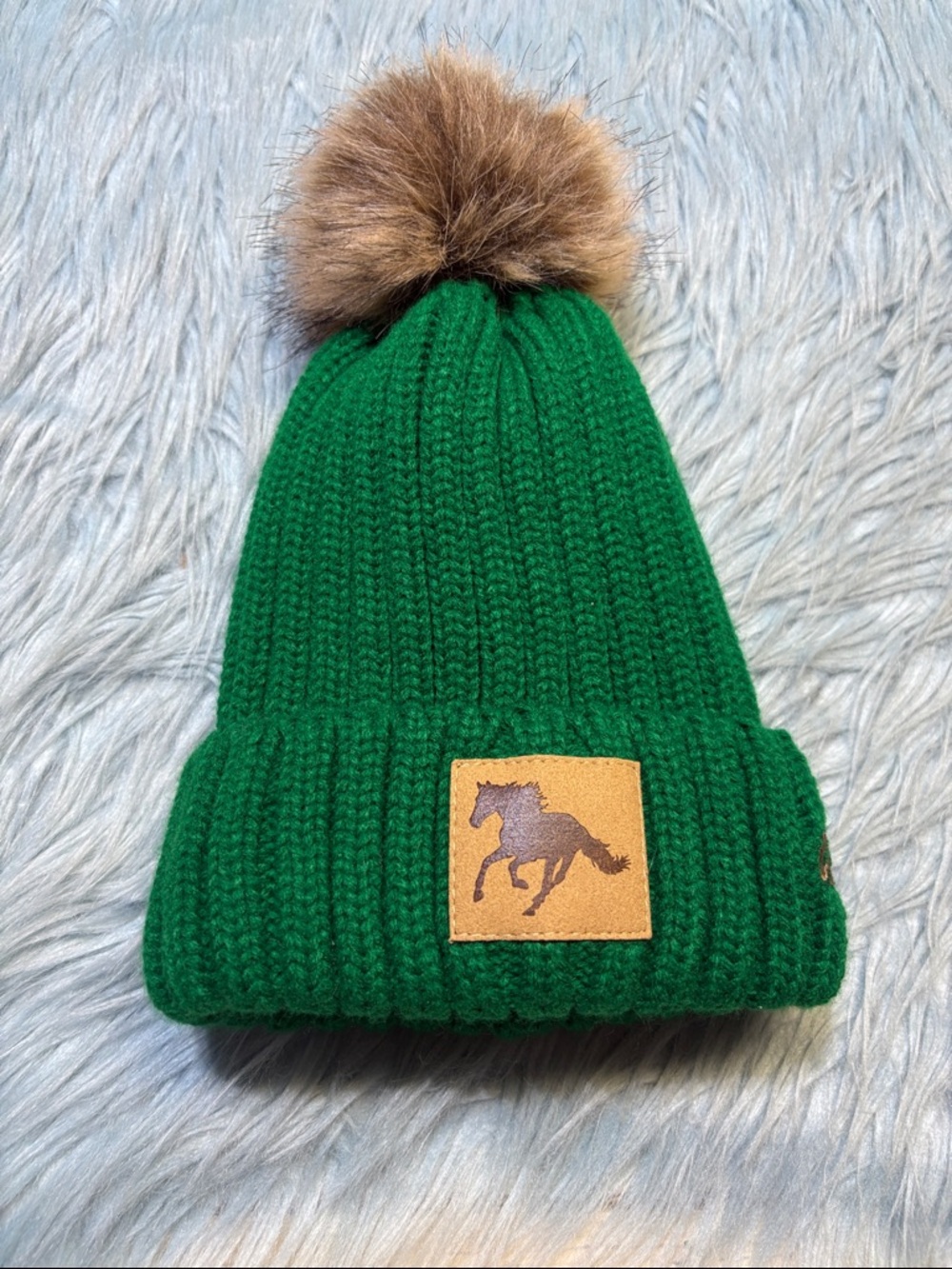 All Seated in a Barn Green Knit Pom Pom Beanie